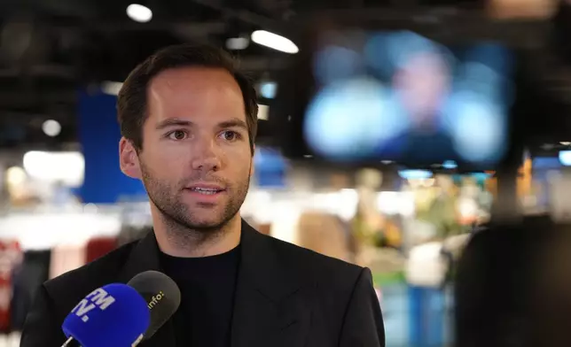 BHV (Bazar de l'Hotel de Ville) general store director Karl-Stephane Cottendin answers reporters ahead of the Chinese company Shein stand opening inside the BHV, Tuesday, Nov. 4, 2025 in Paris. (AP Photo/Aurelien Morissard)