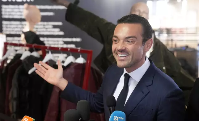 Frederic Merlin, CEO of SGM group which owns the BHV department store, answers reporters before fast fashion powerhouse Shein opens its first permanent store Wednesday, Nov. 5, 2025 in Paris. (AP Photo/Thibault Camus)