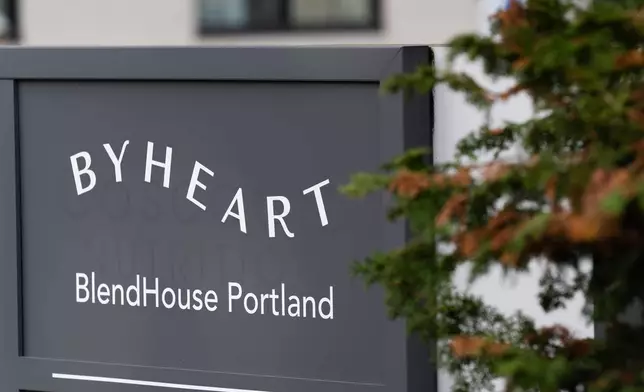 A sign for ByHeart, a manufacturer of organic baby formula, is displayed outside a building that houses a plant for the company on Tuesday, Nov. 11, 2025, in Portland, Ore. (AP Photo/Jenny Kane)