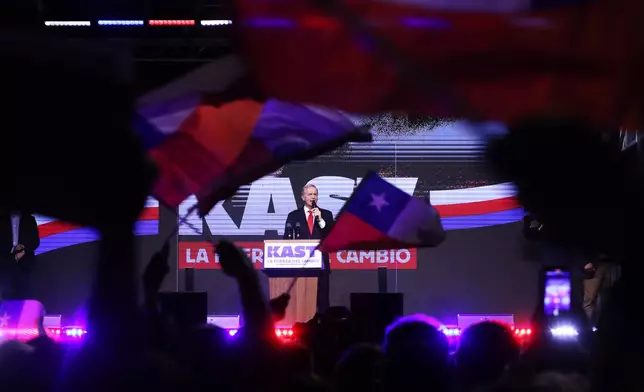 Presidential candidate Jose Antonio Kast of the Republican Party, addresses supporters after early results in the general elections in Santiago, Chile, Sunday, Nov. 16, 2025. (AP Photo/Cristobal Escobar)