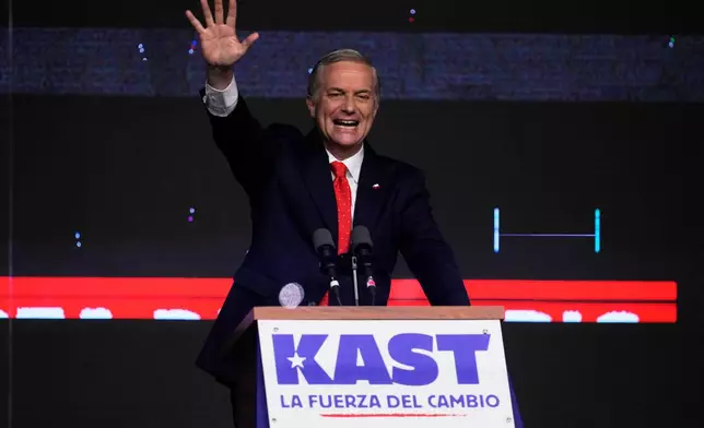 Presidential candidate Jose Antonio Kast of the Republican Party, waves to supporters after early results in the general elections in Santiago, Chile, Sunday, Nov. 16, 2025. (AP Photo/Esteban Felix)