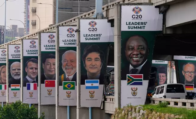 Banners of various G20 leaders are displayed along a Johannesburg freeway, in Johannesburg, South Africa, Thursday, Nov. 20, 2025. (AP Photo/Themba Hadebe)