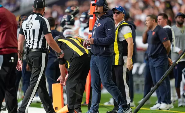 Chicago Bears head coach Ben Johnson stands on the sidelines during the second half of an NFL football game against the Minnesota Vikings, Sunday, Nov. 16, 2025, in Minneapolis. (AP Photo/Abbie Parr)