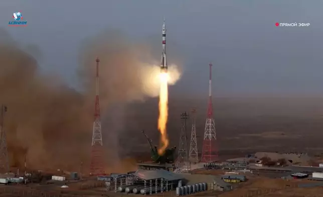 In this photo taken from video released by Roscosmos space corporation, the Soyuz-2.1 rocket booster with Soyuz MS-28 space ship carrying NASA astronaut Chris Williams and Roscosmos cosmonauts Sergey Kud-Sverchkov and Sergey Mikaev, a new crew to the International Space Station, ISS, blasts off in Russian leased Baikonur cosmodrome, Kazakhstan, Thursday, Nov. 27, 2025. (Roscosmos space corporation, via AP)