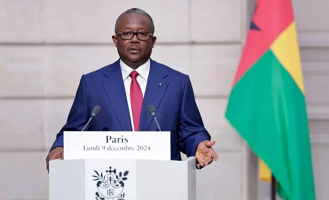 FILE - Guinea-Bissau's President Umaro Sissoco Embalo speaks during a joint press conference with French president at the Elysee Presidential Palace in Paris Monday Dec. 9, 2024. (Stephane de Sakutin, Pool via AP, File)