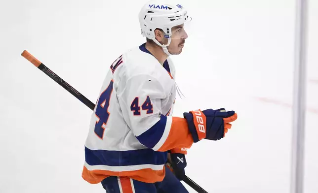 New York Islanders center Jean-Gabriel Pageau celebrates after his goal during the second period of an NHL hockey game against the Washington Capitals, Friday, Oct. 31, 2025, in Washington. (AP Photo/Nick Wass)