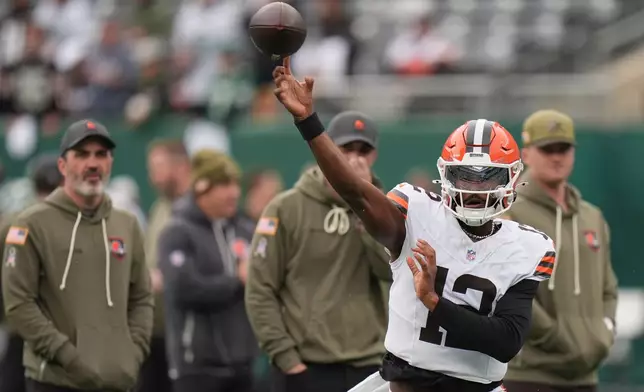 Cleveland Browns quarterback Shedeur Sanders (12) warms up before an NFL football game against the New York Jets, Sunday, Nov. 9, 2025, in East Rutherford, N.J. (AP Photo/Seth Wenig)