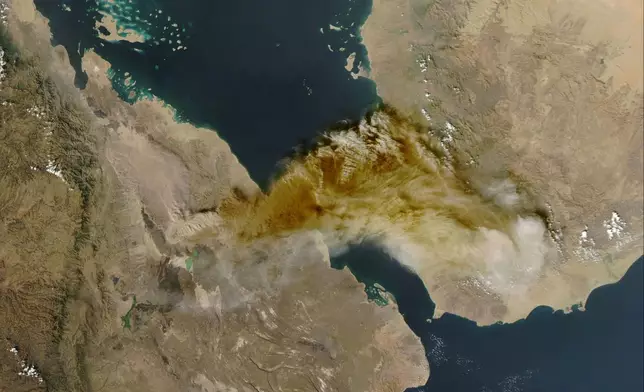 This satellite image released by NASA Worldview shows the Hayli Gubbi volcano in Ethiopia erupting on Nov. 23, 2025. (NASA Worldview via AP)