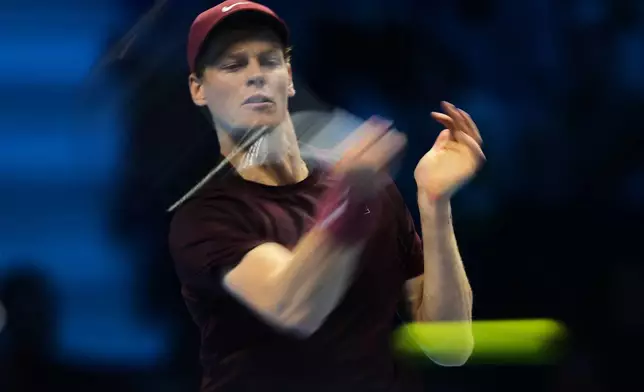 Italy¥s Jannik Sinner Canada¥s Felix Auger-Aliassime returns the ball to Italy¥s Jannik Sinner Canada¥s Felix Auger-Aliassime during their tennis match of the ATP World Tour Finals, in Turin, Italy, Monday, Nov. 10, 2025. (AP Photo/Antonio Calanni)