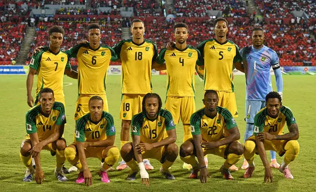 Jamaica's players pose for a photo before a game against Trinidad and Tobago during a World Cup 2026 qualifying soccer match in Port of Spain, Trinidad and Tobago, Thursday, Nov. 13, 2025. (AP Photo/Robert Taylor)