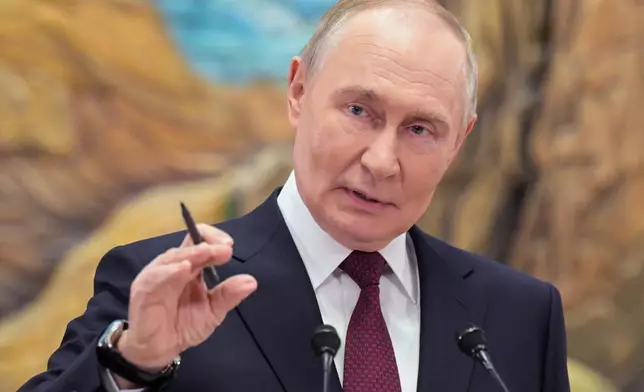 FILE - Russian President Vladimir Putin gestures as he speaks to Russian journalists after the summit of the Collective Security Treaty Organisation (CSTO) in Bishkek, Kyrgyzstan, Nov. 27, 2025. (Alexei Nikolsky, Sputnik, Kremlin Pool Photo via AP, File)