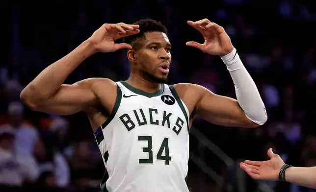 Milwaukee Bucks forward Giannis Antetokounmpo reacts during the second half of an NBA Cup basketball game against the New York Knicks, Friday, Nov. 28, 2025, in New York. (AP Photo/Adam Hunger)