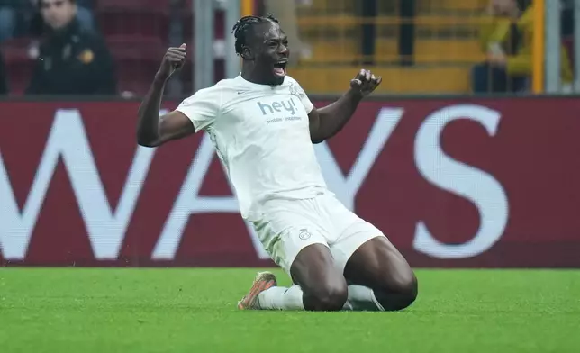 Union SG's Promise David celebrates scoring the opening goal during the Champions League opening phase soccer match between Galatasaray and Union Saint-Gilloise, in Istanbul, Turkey, Tuesday, Nov. 25, 2025. (AP Photo/Francisco Seco)
