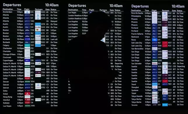 A traveler using TSA Pre-Check waits in a security line at a San Francisco International Airport terminal in San Francisco, Thursday, Nov. 6, 2025. (AP Photo/Jeff Chiu)