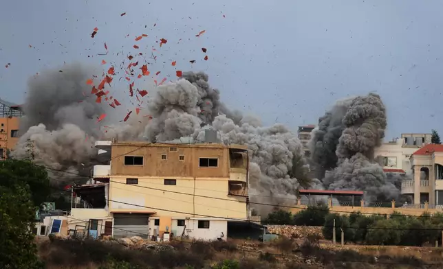 Smoke rises following an Israeli airstrike in the village of Teir Debba, southern Lebanon, Thursday, Nov. 6, 2025. (AP Photo/Mohammad Zaatari)
