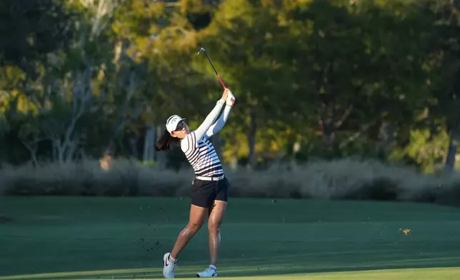 Jeeno Thitikul of Thailand hits from the 18th fairway during the third round of the LPGA Tour Championship golf tournament, Saturday, Nov. 22, 2025, in Naples, Fla. (AP Photo/Marta Lavandier)