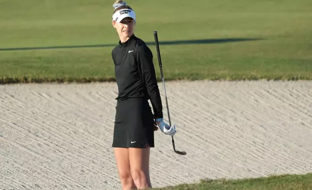 Nelly Korda reacts to her shot on the 17th green during the third round of the LPGA Tour Championship golf tournament, Saturday, Nov. 22, 2025, in Naples, Fla. (AP Photo/Marta Lavandier)