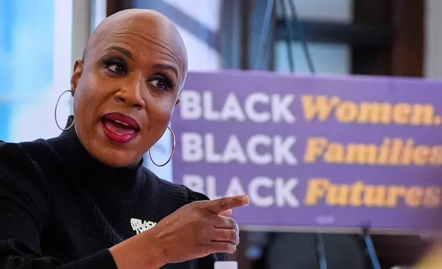 U.S. Rep. Ayanna Pressley, D-Mass. gestures while addressing a gathering at a roundtable meeting, Monday, Nov. 24, 2025, in Boston. (AP Photo/Charles Krupa)