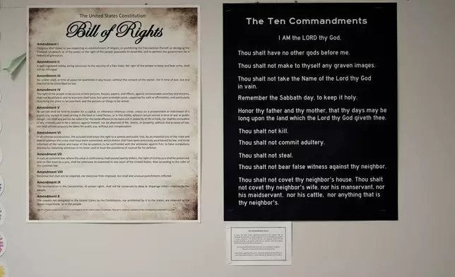 Ten Commandments and Bill of Rights posters are displayed in a classroom at Lehman High School, in Kyle, Texas, Thursday, Oct. 16, 2025. (AP Photo/Eric Gay)
