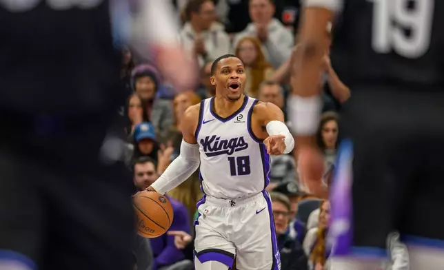 Sacramento Kings guard Russell Westbrook brings the ball up court during the first half of an NBA Cup basketball game against the Utah Jazz, Friday, Nov. 28, 2025, in Salt Lake City. (AP Photo/Tyler Tate)