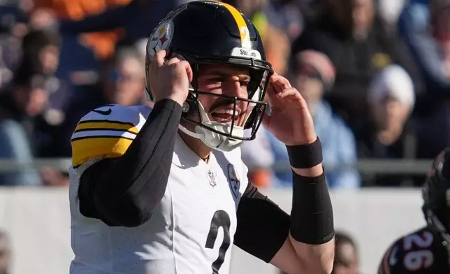 Pittsburgh Steelers quarterback Mason Rudolph (2) calls signals during the first half of an NFL football game against the Chicago Bears, Sunday, Nov. 23, 2025, in Chicago. (AP Photo/Nam Huh)