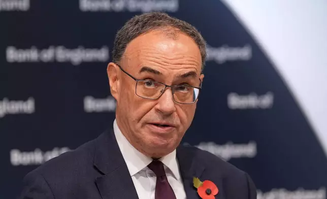Andrew Bailey, Governor of the Bank of England, attends the Bank of England Monetary Policy Report news Conference, at the Bank of England, in the City of London on Thursday Nov. 6, 2025. (Maja Smiejkowska/PA via AP)