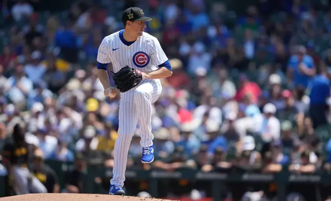 FILE - Chicago Cubs pitcher Kyle Hendricks winds up in the first inning of a baseball game against the Pittsburgh Pirates, May 17, 2024, in Chicago. (AP Photo/Charles Rex Arbogast, File)