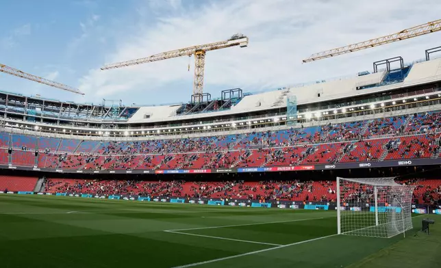 A general view of the Nou Camp stadion under reconstrucyion is see before La Liga soccer match between Barcelona and Athletic in Barcelona, Spain, Saturday, Nov. 22, 2025. AP Photo/Joan Monfort)