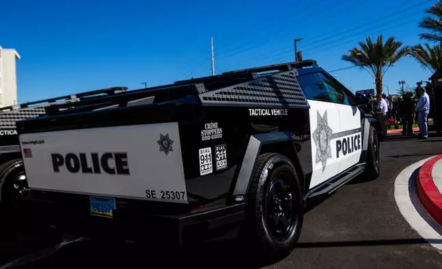 A Tesla Cybertruck owned by the Las Vegas Metro Police department is on display in Las Vegas on Tuesday Oct, 28th 2025. (AP Photo/Ty ONeil)