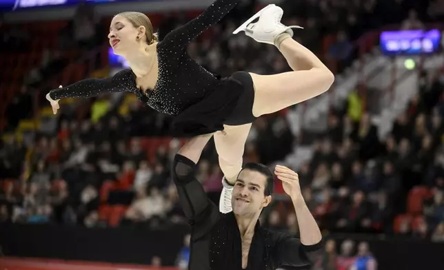 Minerva Fabienne Hase and Nikita Volodin of Germany perform in Pairs Short Program during figure skating ISU Grand Prix Finlandia Trophy Helsinki competition in Helsinki, Finland, Friday Nov. 21, 2025. (Vesa Moilanen/Lehtikuva via AP)