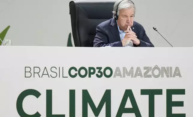 United Nations Secretary-General Antonio Guterres listens to Brazilian President Luiz Inacio Lula da Silva's speech at the COP30 U.N. Climate Summit in Belem, Brazil, Thursday, Nov. 6, 2025. (AP Photo/Fernando Llano)