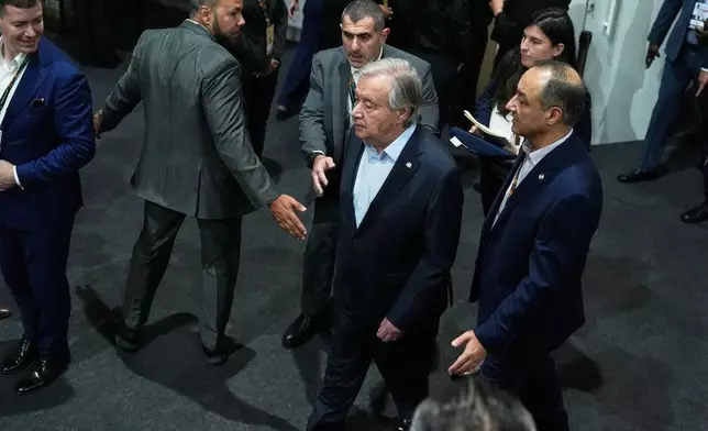 U.N. Secretary-General Antonio Guterres arrives to attend a plenary session at the COP30 U.N. Climate Summit in Belem, Brazil, Thursday, Nov. 6, 2025. (AP Photo/Fernando LLano)