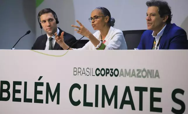 Brazil's Environment Minister Marina Silva, center, Minister of Climate and the Environment of Norway Andreas Bjelland Eriksen, left, and Brazil's Economy Minister Fernando Haddad hold a press conference during the COP30 U.N. Climate Summit, in Belem, Brazil, Thursday, Nov. 6, 2025. (AP Photo/Paulo Santos)