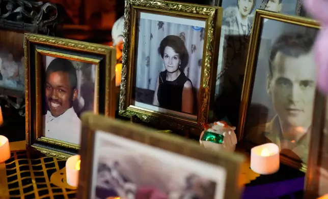 Photographs are part of a Día de Muertos ofrenda displayed at an event at the National Museum of Mexican Art, Saturday, Oct. 25, 2025, in Chicago. (AP Photo/Erin Hooley)