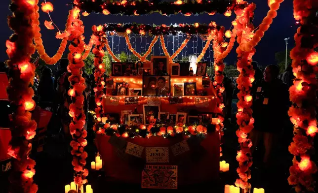 Maria Rojano's Día de Muertos ofrenda is displayed at an event at the National Museum of Mexican Art, Saturday, Oct. 25, 2025, in Chicago. (AP Photo/Erin Hooley)
