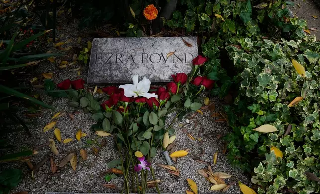 The grave of Ezra Pound inside the San Michele cemetery, on All Soul's Day, in Venice, Italy, Sunday, Nov. 2, 2025. (AP Photo/Luca Bruno)