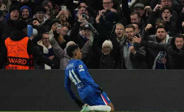 Chelsea's Estevao celebrates after scoring his side's second goal during the Champions League opening phase soccer match between Chelsea and Barcelona in London, Tuesday, Nov. 25, 2025. (AP Photo/Kin Cheung)
