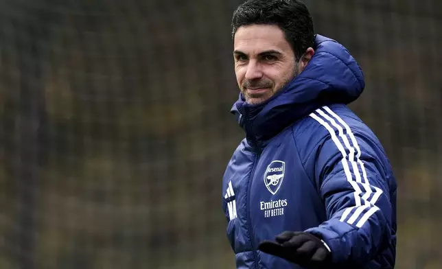 Arsenal manager Mikel Arteta arrives for a training session at the Sobha Realty Training Centre, London, Tuesday Nov. 25, 2025 ahead of Wednesday's Champions League match against Bayern Munich. (John Walton/PA via AP)