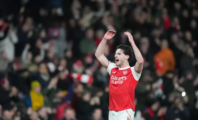Arsenal's Declan Rice celebrates after a Premier League soccer match between Arsenal and Tottenham in London, Sunday, Nov. 23, 2025. (AP Photo/Frank Augstein)