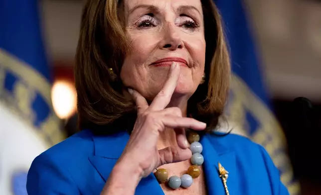 FILE - House Speaker Nancy Pelosi of Calif. reacts as she listens to a question from a reporter during her weekly press briefing on Capitol Hill, Thursday, Sept. 30, 2021, in Washington. (AP Photo/Andrew Harnik File)