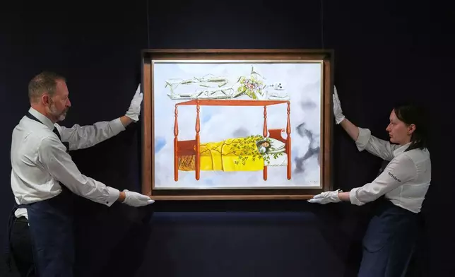 FILE - A painting by Frida Kahlo titled "El sueño (La cama)" or (The Dream (The Bed), is displayed at Sotheby's auction rooms in London, Sept. 19, 2025. The painting, estimated at 40-60 million US dollars, is part of a collection of surrealist masterpieces unveiled ahead of its upcoming sale in New York. (AP Photo/Kirsty Wigglesworth, File)