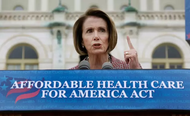 FILE - House Speaker Nancy Pelosi of Calif., gestures while speaking about health care during a news conference on Capitol Hill in Washington, Oct. 29, 2009. (AP Photo/Alex Brandon File)