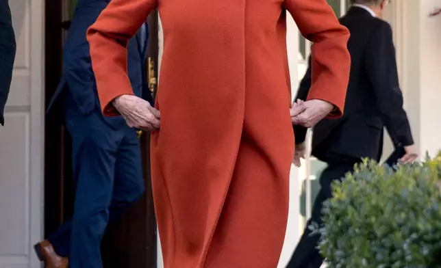FILE - House Minority Leader Nancy Pelosi, D-Calif., walks out of the West Wing to speak to members of the media outside of the White House in Washington, Dec. 11, 2018, following a meeting with President Donald Trump. (AP Photo/Andrew Harnik, File)