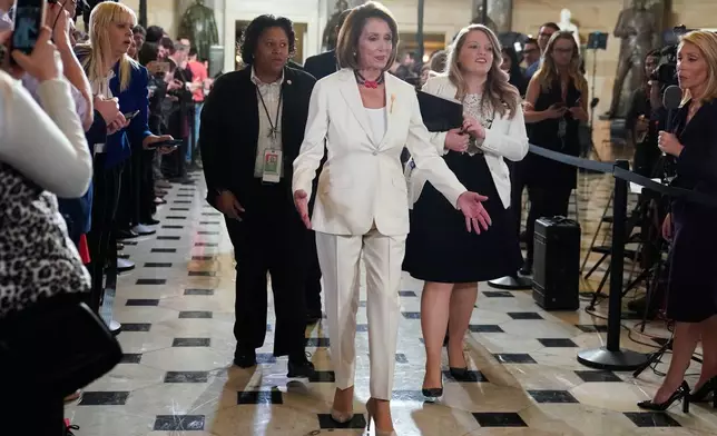 FILE - House Speaker Nancy Pelosi, D-Calif., arrives to listen to President Donald Trump deliver his State of the Union address to a joint session of Congress on Capitol Hill in Washington, Feb. 5, 2019. (AP Photo/Carolyn Kaster, File)