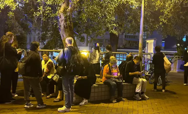 Residents are waiting at the scene for upcoming information after escaping from their home, Photo by Bastille Post