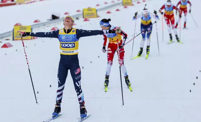 United States' Jessie Diggins crosses the finish line to win a women's cross-country 20km Skiathlon Classic/Free during the Cross-Country skiing World Cup races in Trondheim, Norway, Saturday, Dec. 6, 2025. (Geir Olsen/NTB Scanpix via AP)