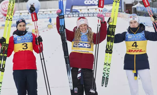 United States' Jessie Diggins, center, winner of a women's cross-country 20km Skiathlon Classic/Free celebrates with second-placed Norway's Heidi Weng, left, and third-placed Sweden's Ebba Andersson during the Cross-Country skiing World Cup, in Trondheim, Norway, Saturday, Dec. 6, 2025. (Geir Olsen/NTB Scanpix via AP)