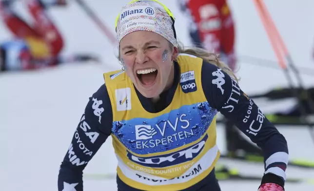 United States' Jessie Diggins celebrates winning a women's cross-country 20km Skiathlon Classic/Free during the Cross-Country skiing World Cup races in Trondheim, Norway, Saturday, Dec. 6, 2025. (Geir Olsen/NTB Scanpix via AP)