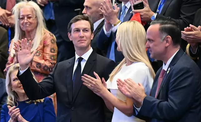 FILE - Jared Kushner with his wife, Ivanka Trump, acknowledges applause at the Israeli parliament, the Knesset, in Jerusalem, Oct. 13, 2025. (Saul Loeb/Pool via AP, File)
