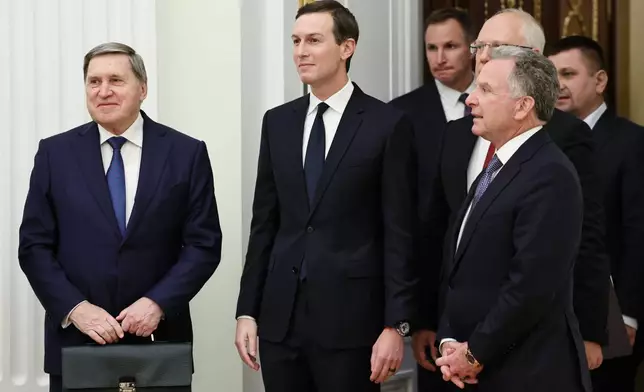FILE - Russian Presidential foreign policy adviser Yuri Ushakov, left, U.S. President Donald Trump's son-in-law Jared Kushner, center, U.S. special envoy Steve Witkoff, foreground right, and Russian Direct Investment Fund CEO Special Presidential Representative for Investment and Economic Cooperation with Foreign Countries Kirill Dmitriev, behind Witkoff, arrive to attend talks with Russian President Vladimir Putin at the Senate Palace of the Kremlin in Moscow, Russia, Dec. 2, 2025. (Alexander Kazakov, Sputnik, Kremlin Pool Photo via AP, File)